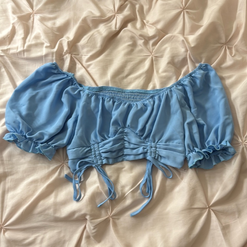 blue crop/off shoulder shirt